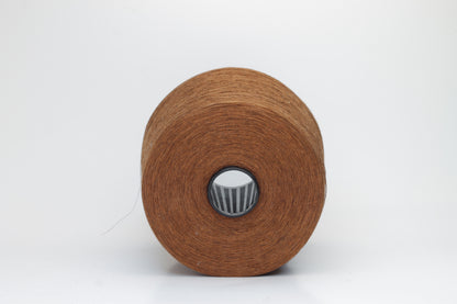 Fine, single-ply linen yarn in a Mostarda. Reveals a crisp texture and subtle natural sheen, typical of pure linen fiber.