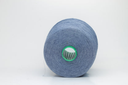 Fine, single-ply linen yarn in a rich Oceano. Reveals a crisp texture and subtle natural sheen, typical of pure linen fiber.