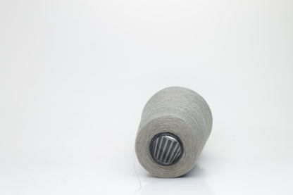 Fine, single-ply linen yarn in a rich Silver Gray. Reveals a crisp texture and subtle natural sheen, typical of pure linen fiber.