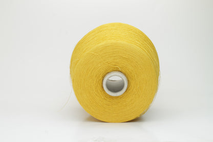 Close-up of a brightly twisted single-ply yarn, a sunny yellow color with a subtle matte finish and visible linen slubs throughout.