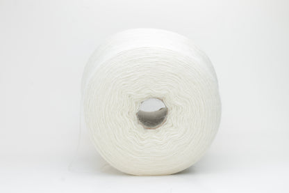 A close-up shot of a single ply, pure white alpaca yarn, softly twisted, showcasing its ethereal fluffiness and subtle sheen against a neutral background.