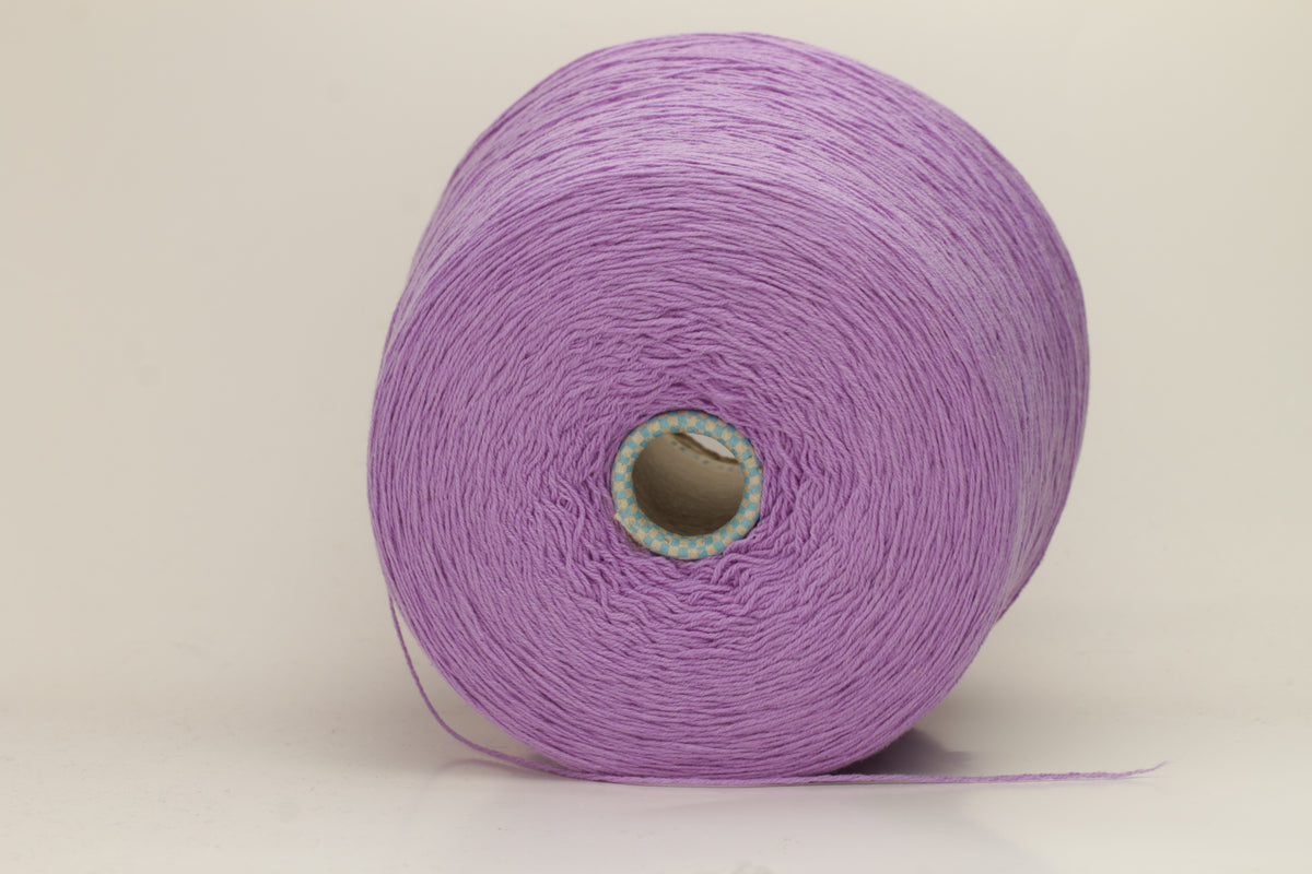 Vivid royal purple cashmere yarn, softly coiled, showcasing its fine 6-ply twist and subtle lustrous sheen, ideal for luxury textiles.