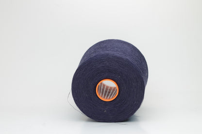 Fine, single-ply linen yarn in a rich Blue Boy. Reveals a crisp texture and subtle natural sheen, typical of pure linen fiber.