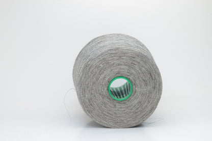Fine, single-ply linen yarn in a New Opale. Reveals a crisp texture and subtle natural sheen, typical of pure linen fiber.
