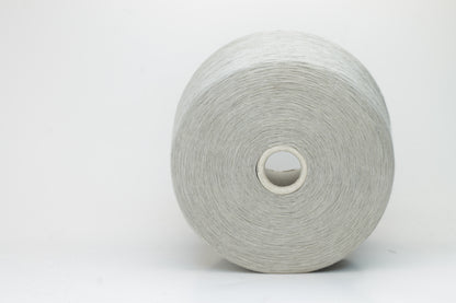 Fine, single-ply linen yarn in a rich Silver. Reveals a crisp texture and subtle natural sheen, typical of pure linen fiber.