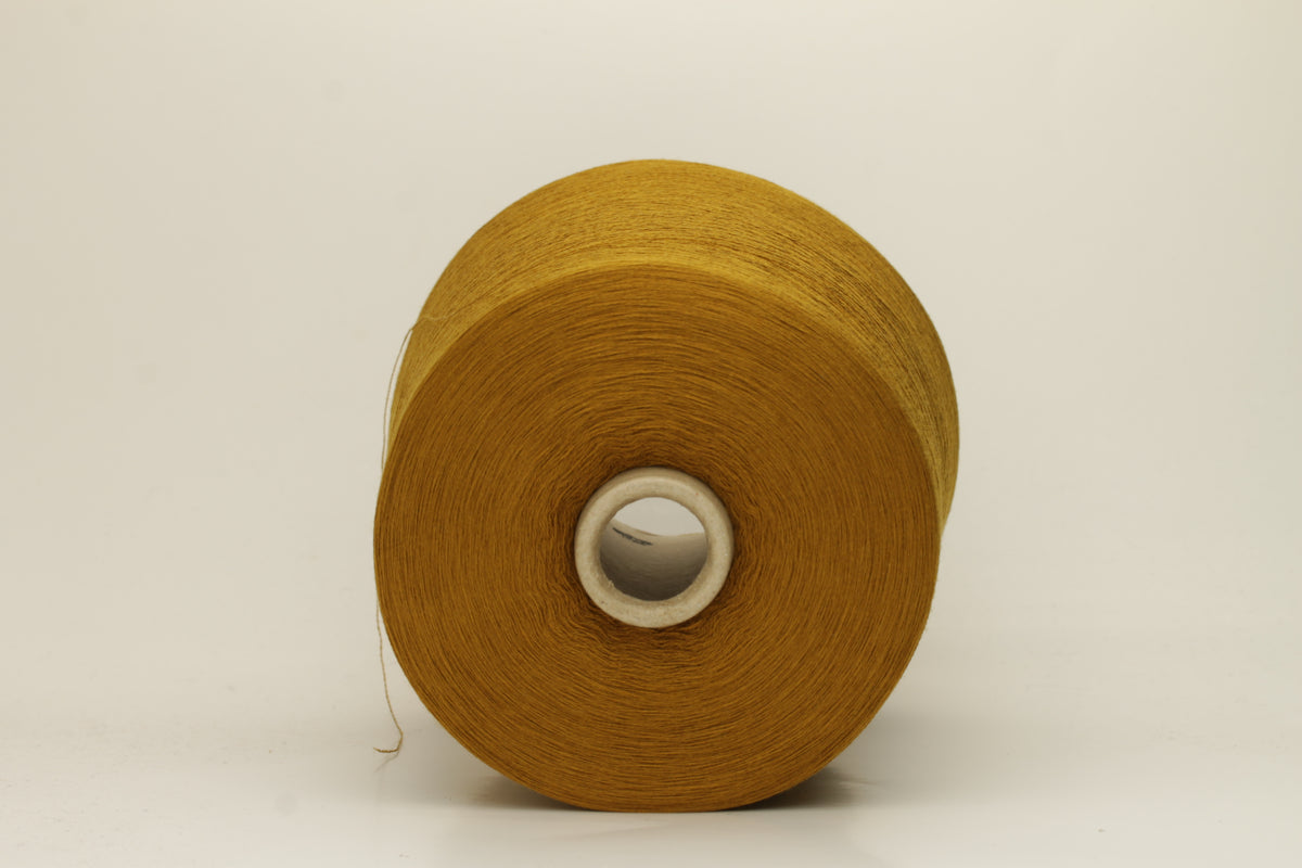 Luxurious, fine Loro Piana silk yarn in a rich, deep dark mustard color. Smooth, evenly spun single strand with a brilliant natural sheen.