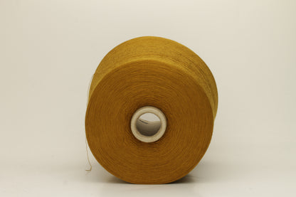 Luxurious, fine Loro Piana silk yarn in a rich, deep dark mustard color. Smooth, evenly spun single strand with a brilliant natural sheen.