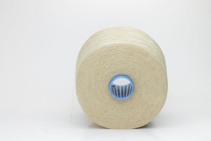Fine, single-ply linen yarn in a rich Oatmeal. Reveals a crisp texture and subtle natural sheen, typical of pure linen fiber.