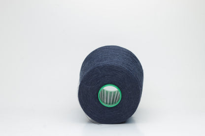 Fine, single-ply linen yarn in a rich Marina. Reveals a crisp texture and subtle natural sheen, typical of pure linen fiber.