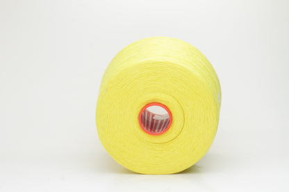 Fine, single-ply linen yarn in a Canarino. Reveals a crisp texture and subtle natural sheen, typical of pure linen fiber.