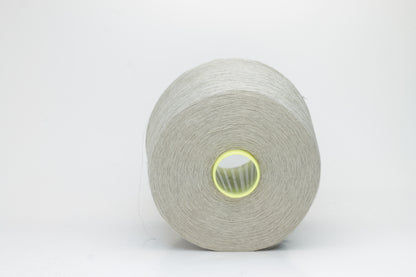 Fine, single-ply linen yarn in a rich Naturale. Reveals a crisp texture and subtle natural sheen, typical of pure linen fiber.