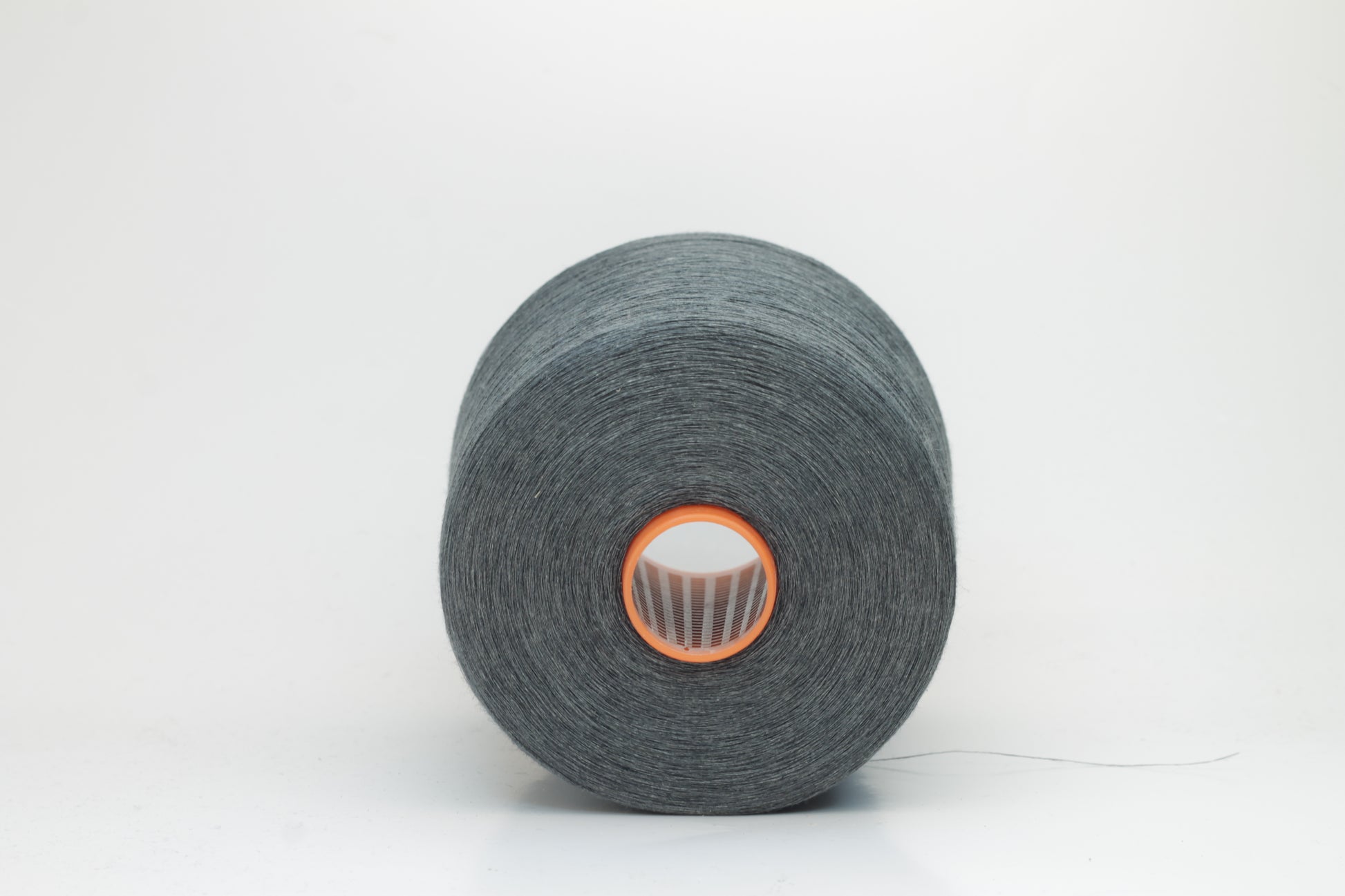 Fine, single-ply linen yarn in a rich Deep Sage Charcoal. Reveals a crisp texture and subtle natural sheen, typical of pure linen fiber.