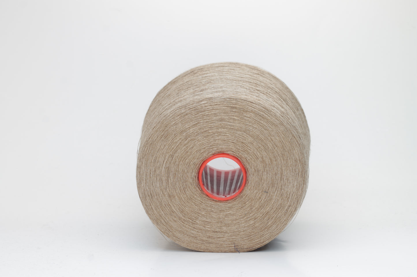 Fine, single-ply linen yarn in a rich Natural Taupe. Reveals a crisp texture and subtle natural sheen, typical of pure linen fiber.