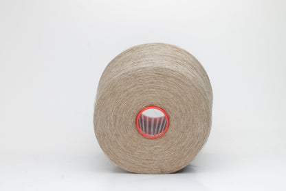 Fine, single-ply linen yarn in a rich Natural Taupe. Reveals a crisp texture and subtle natural sheen, typical of pure linen fiber.