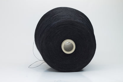 Finely spun Nm 2/26 linen yarn in a rich, deep ardesia slate gray, showcasing a smooth, uniform twist and subtle natural sheen.